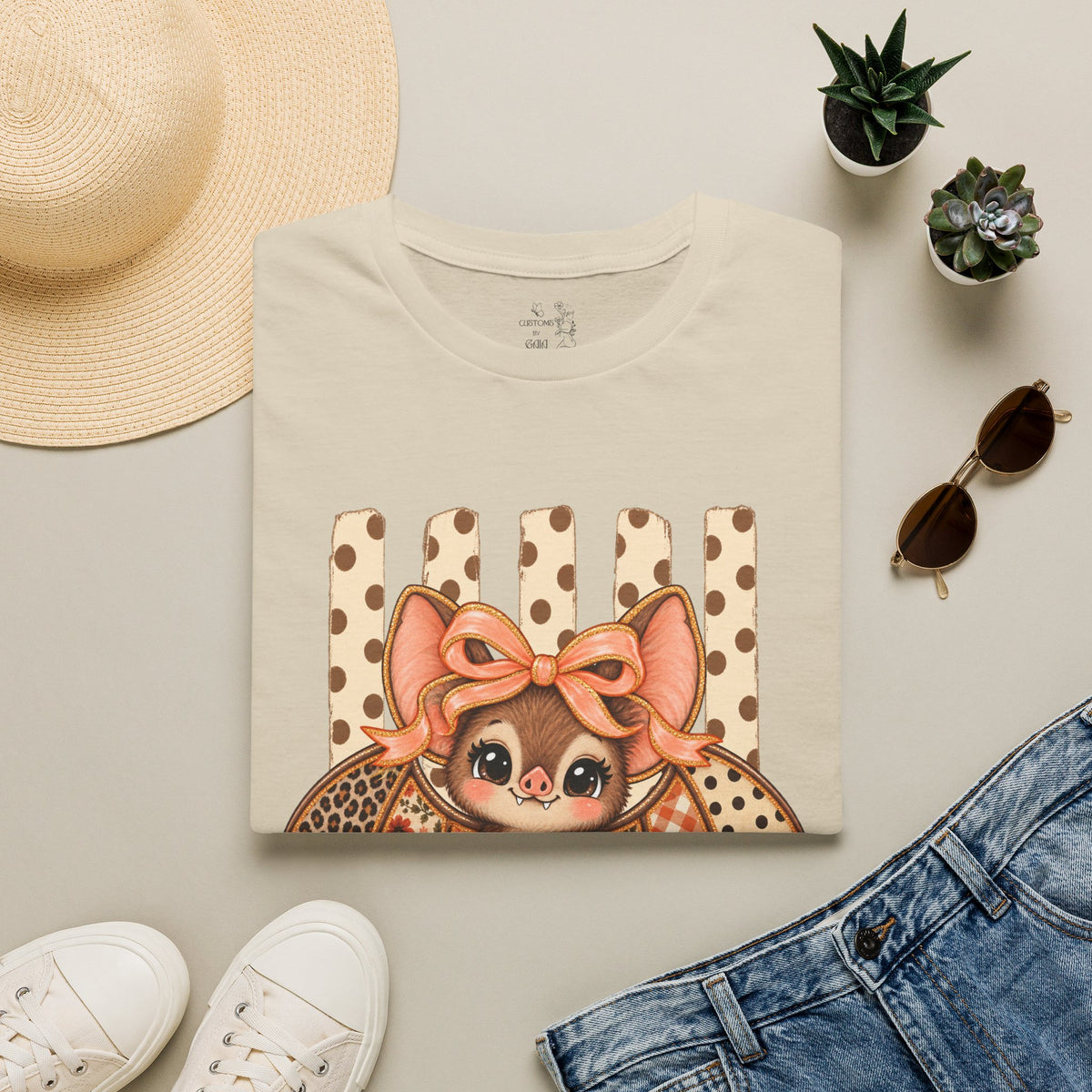 Cute Bat Tee — Adorable Bat with Bow Graphic T-Shirt (Leopard Striped Background)
