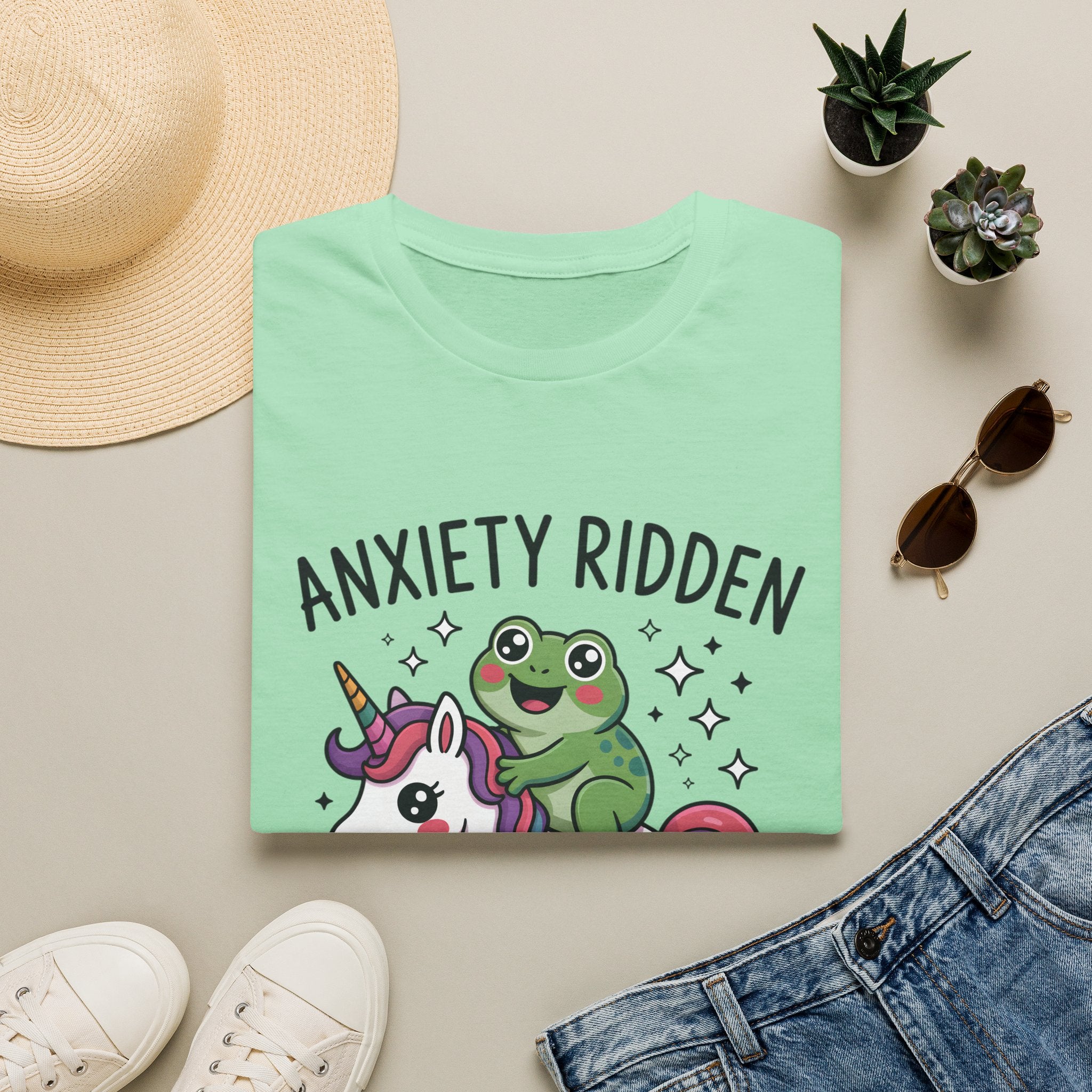 Anxiety Ridden Frog on Unicorn T-Shirt — Cute Mental Health Awareness Graphic Tee