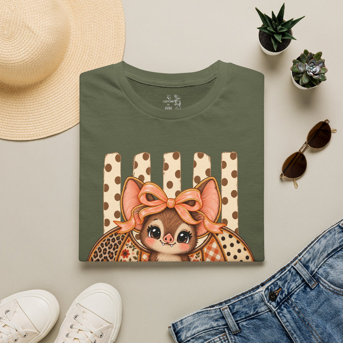 Cute Bat Tee — Adorable Bat with Bow Graphic T-Shirt (Leopard Striped Background)