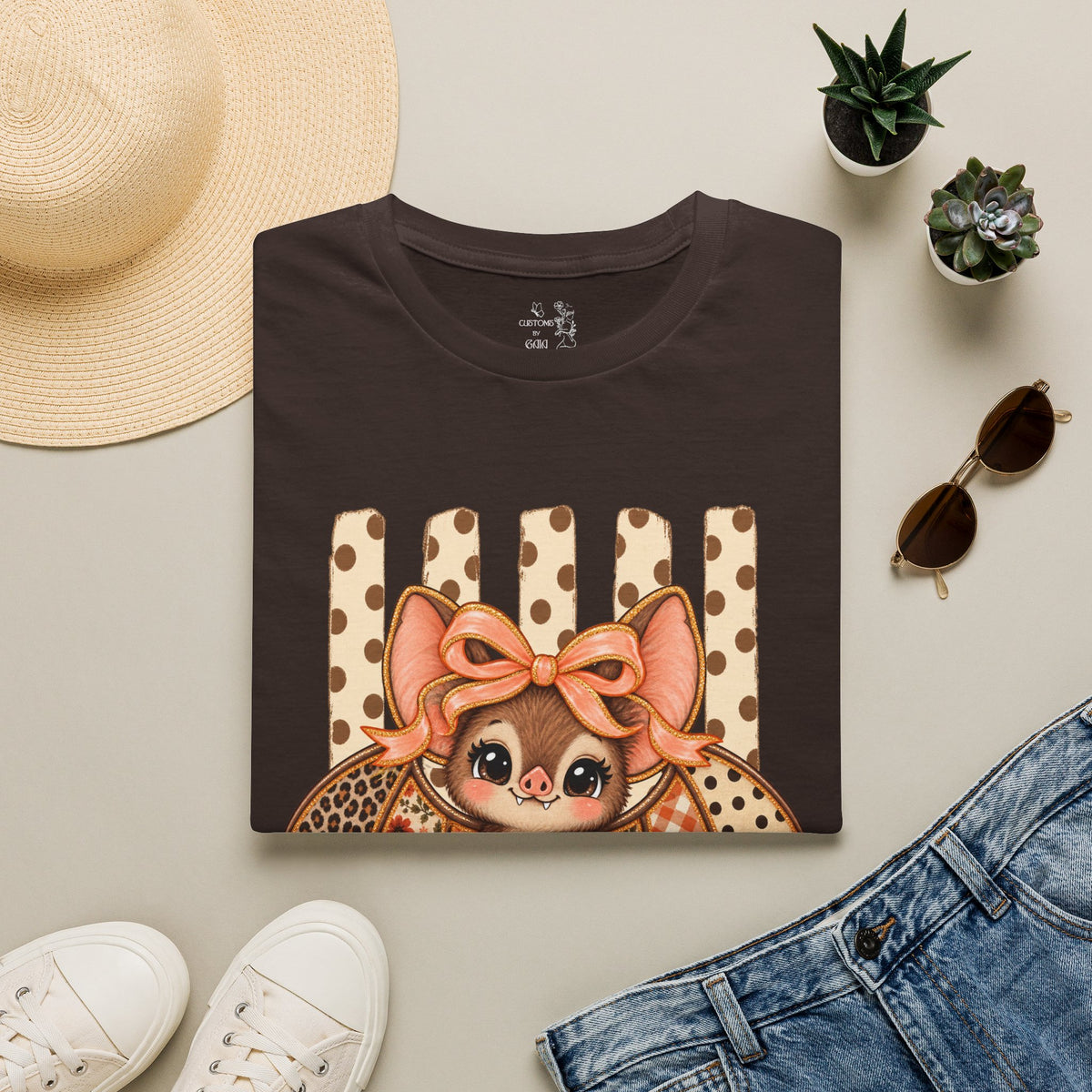 Cute Bat Tee — Adorable Bat with Bow Graphic T-Shirt (Leopard Striped Background)